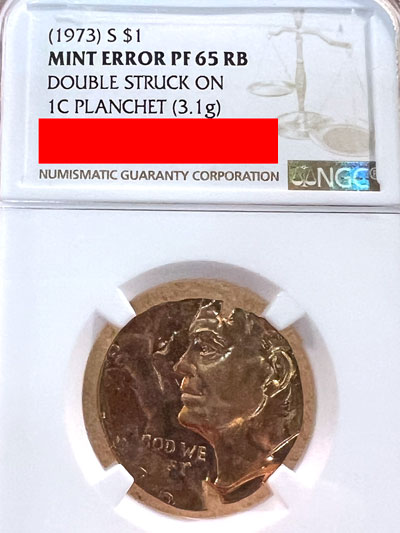 Mint Error 1973 Eisenhower dollar struck on one cent planchet