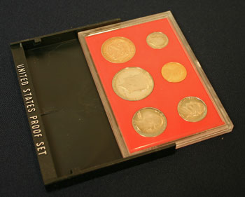 1982 Proof Set slides out of black stand