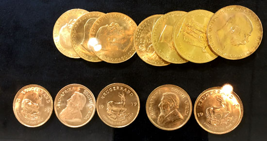 several gold 20 coronas and 1 ounce Kruggerands