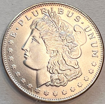 Morgan silver round obverse Morgan silver round obverse